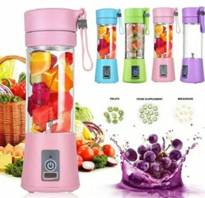 Pink portable USB blender with six blades and a 380ml cup on a kitchen counter.