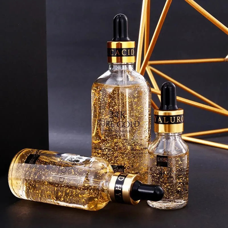 24K gold nicotinamide anti-aging facial essence in a glass bottle with three size options 15ml, 50ml, 100ml