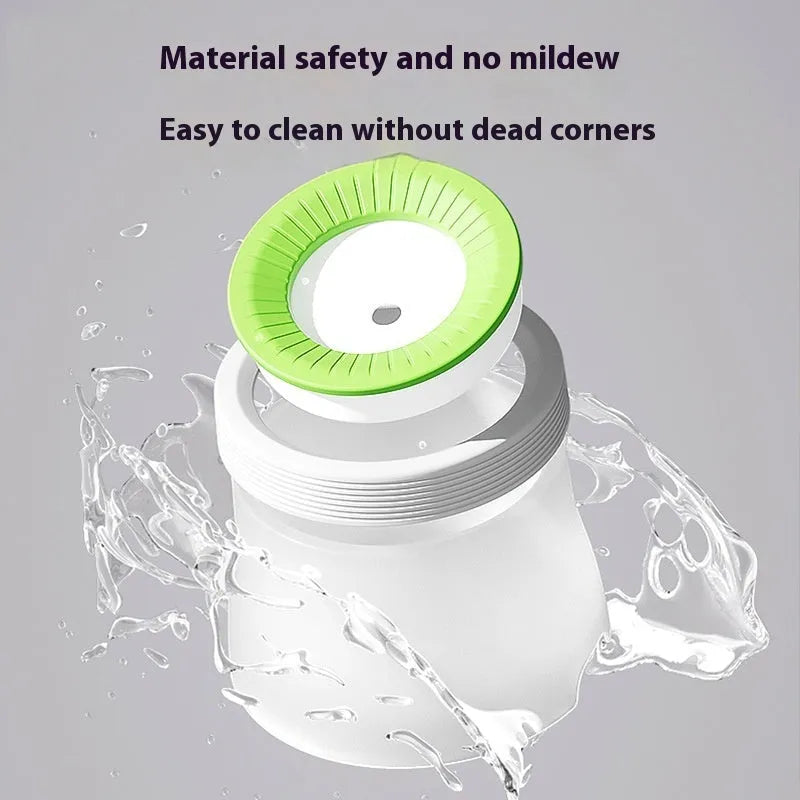 Suspended green pet water bowl for dogs and cats on a white plate base.