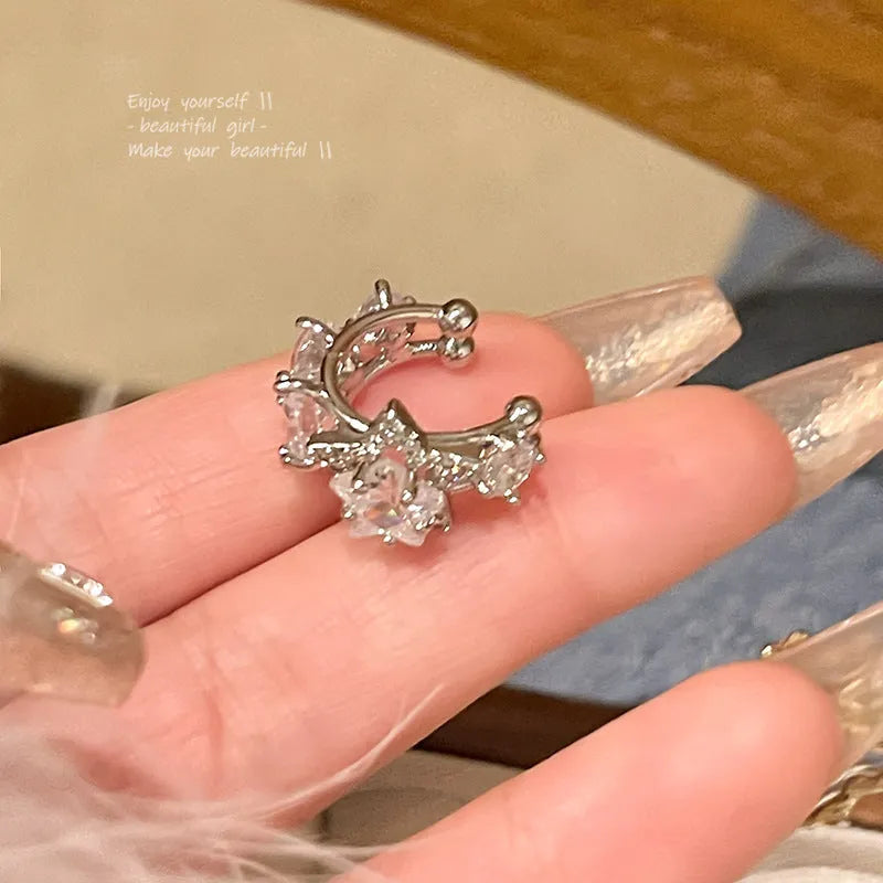Women's silver electroplated copper star earrings with geometric five-pointed star design