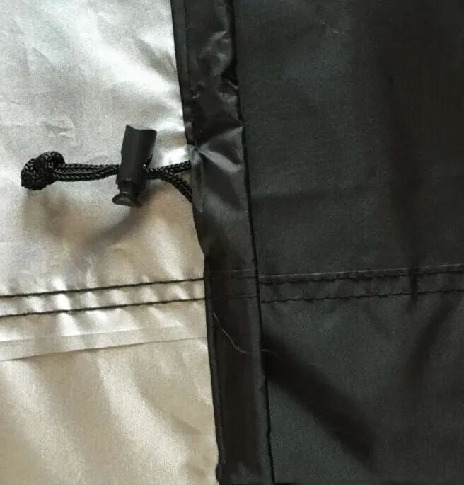 Black outdoor grill cover with silver inner coating, 58x77cm, for barbecue protection
