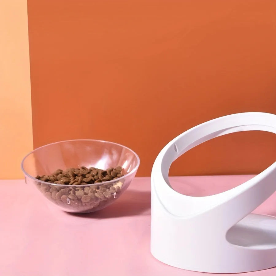 White elevated plastic cat food bowl with a tilted feeding surface for neck protection.