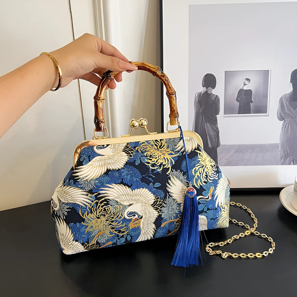 Canvas shell shape crossbody bag with ethnic embroidery, 27cm x 17cm x 7cm, available in black