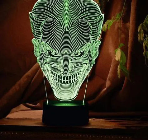 USB-powered 3D LED table lamp with remote control showing multiple colour options