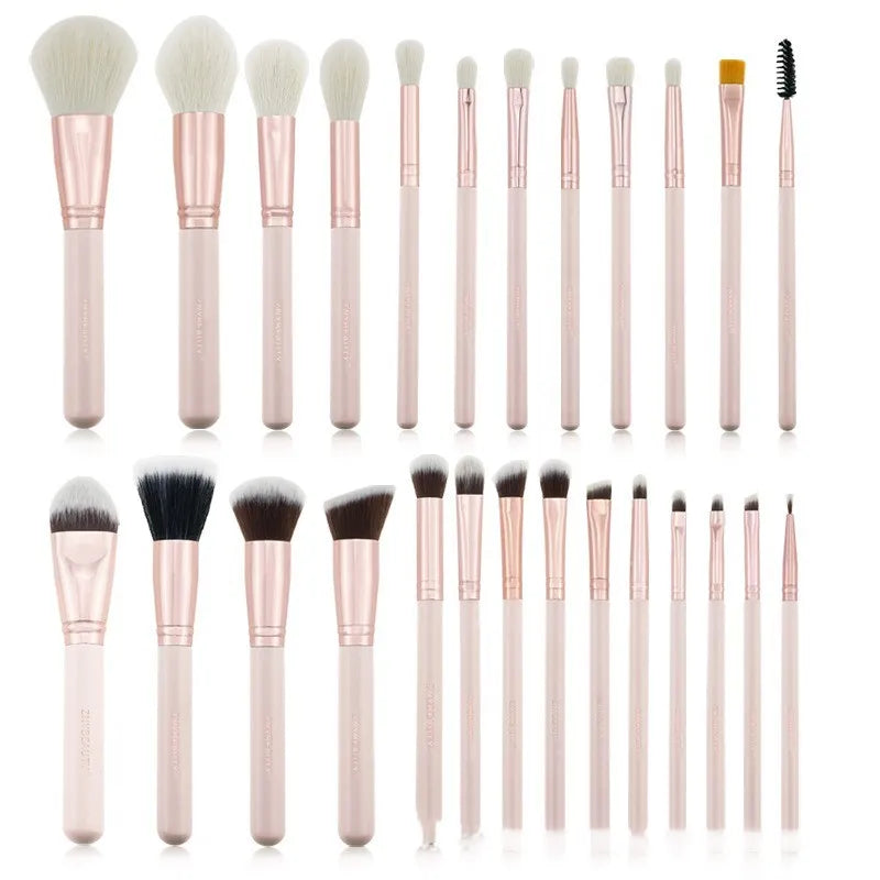 26 pink wooden handle makeup brushes with natural wool bristles in a PU storage bag.