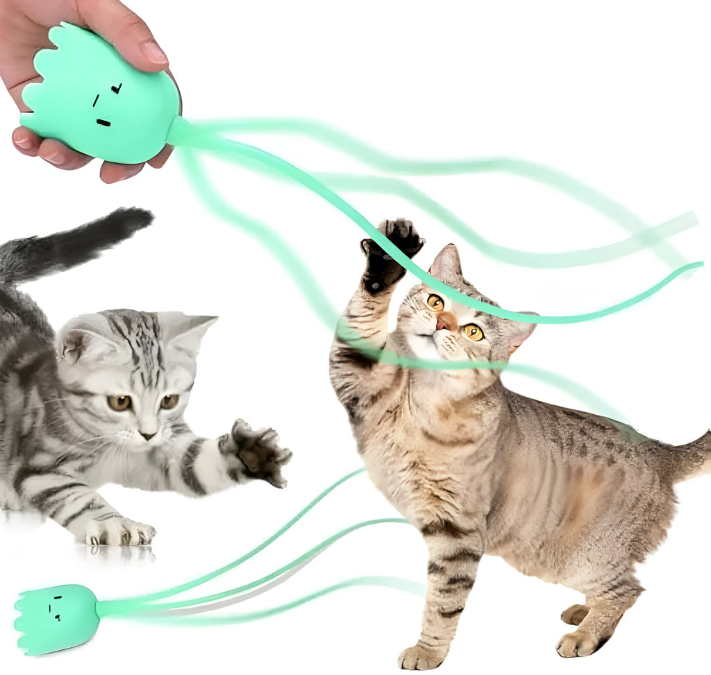 Electronic cat toy with swinging green silicone tail on plastic base