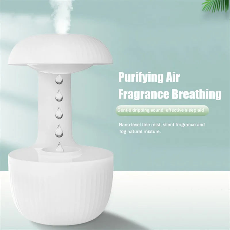 White anti-gravity levitating humidifier showing water droplets flowing upward with cool mist output