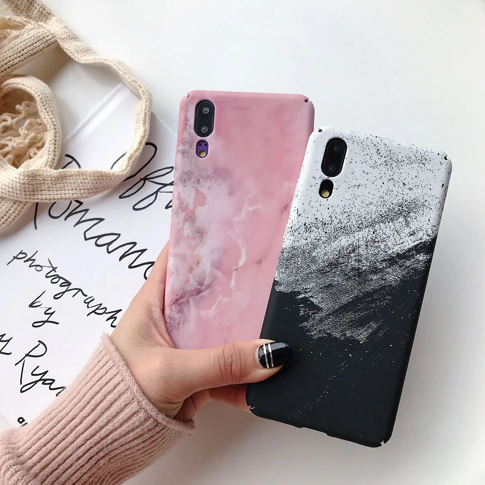 Painted solid colour phone case for Honor and Huawei smartphones in black or pink.