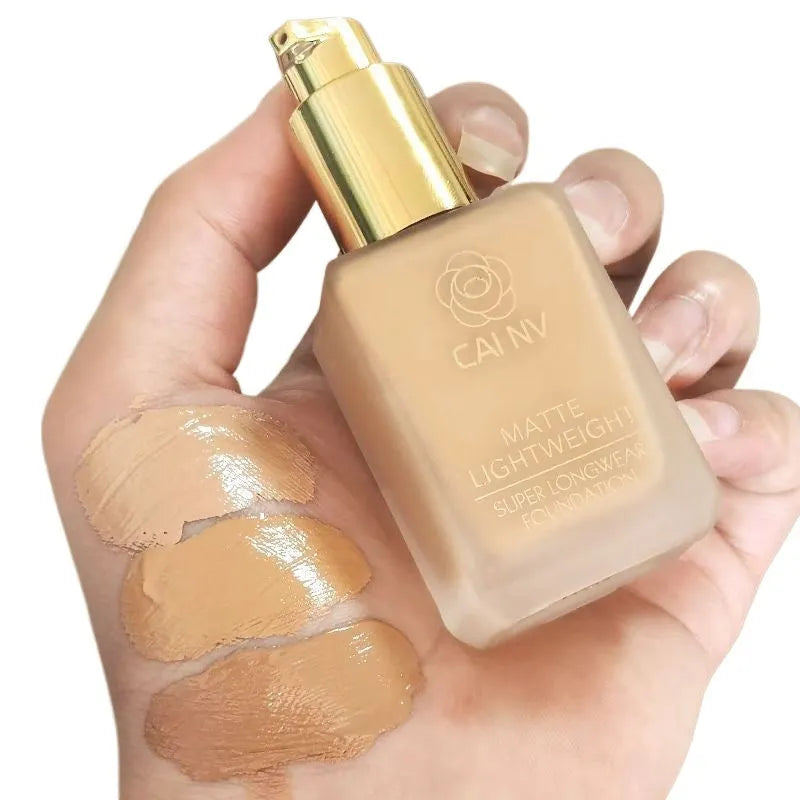 Wheat colour liquid foundation in black leather case with white blend agent for combination skin