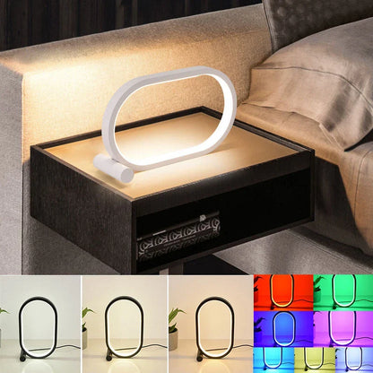 Oval acrylic desk lamp with touch controls, USB charging, and energy-efficient LED lighting