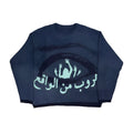 Men's grey abstract print pullover sweater with loose fit and round neck.