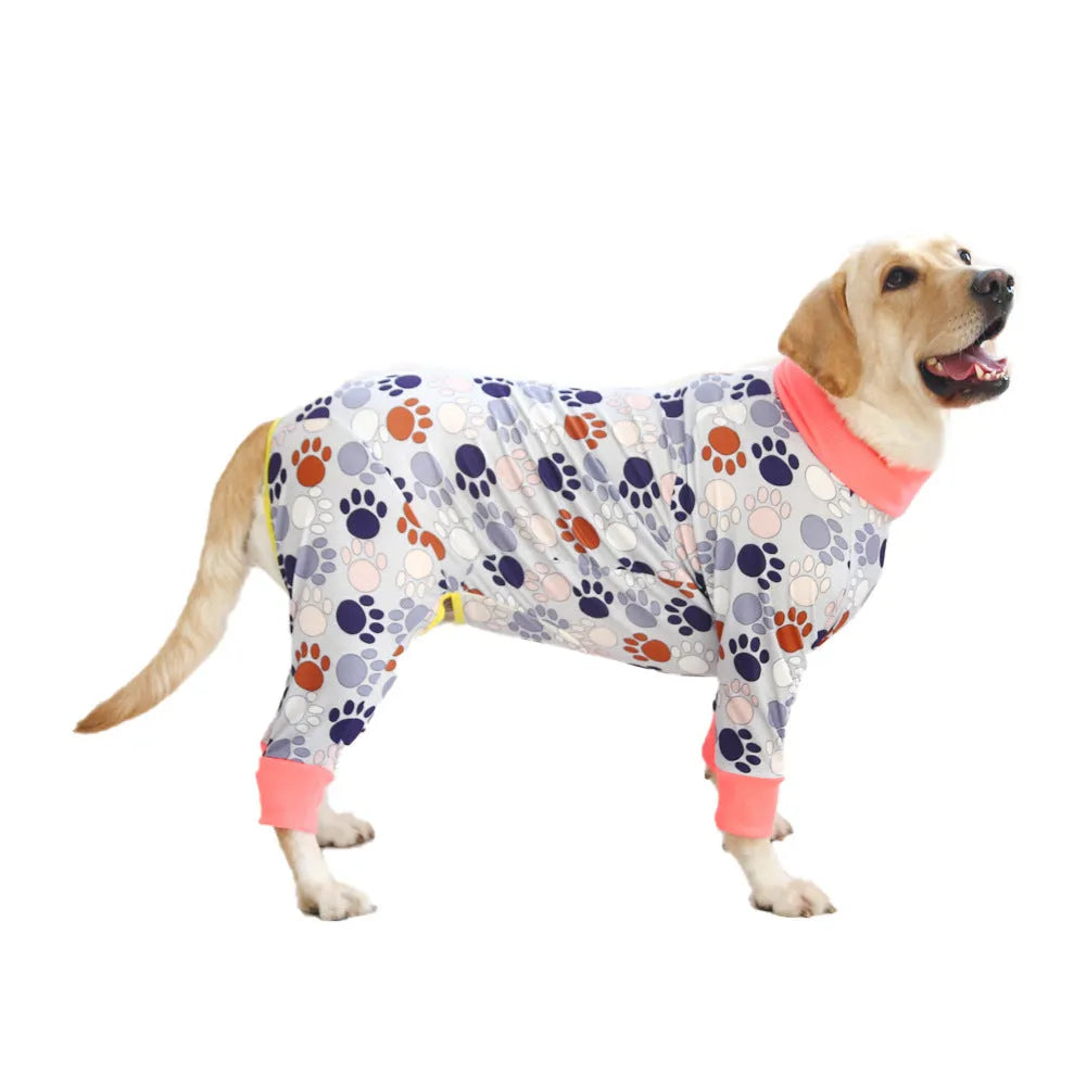 Cotton dog jumpsuit with cartoon print on small dog showing full-body coverage