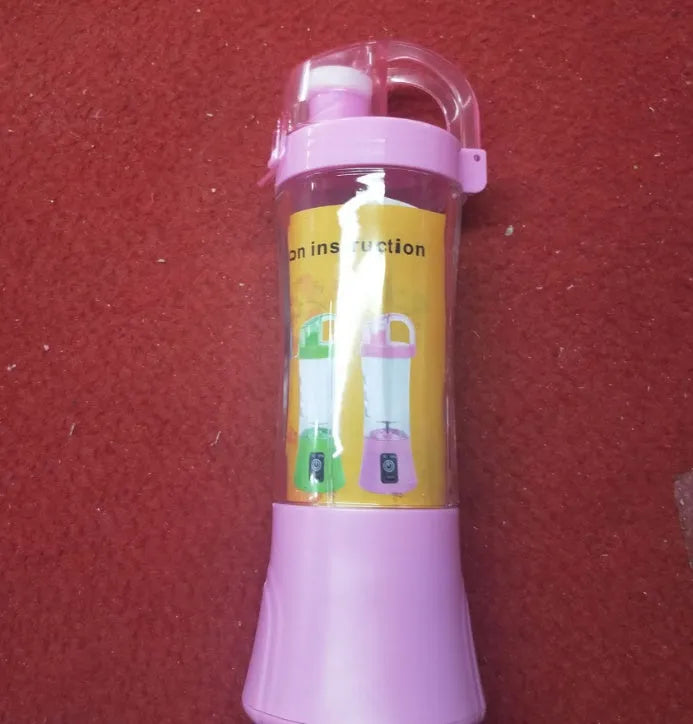 Blue portable electric handheld juicer with USB charging port and 400ml measurement markings on cup.