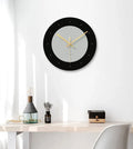 Minimalist transparent tempered glass wall clock with silent movement, 29.5cm diameter, on a light wall.