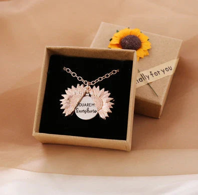 A stunning sunflower pendant necklace with an adjustable chain in various fashionable colors