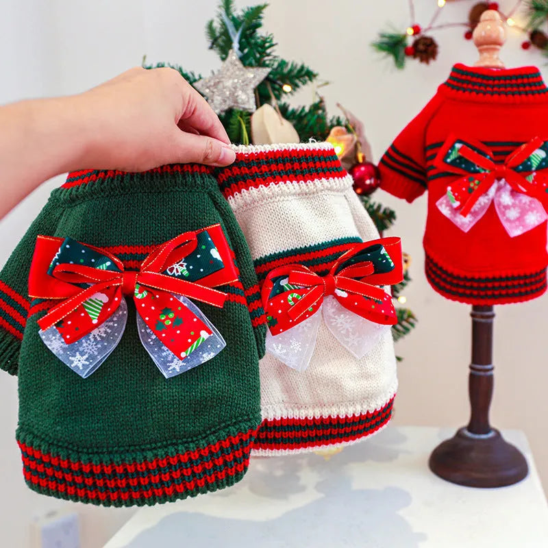 Red 'Merry Christmas' knitted jumper on a small dog, showing festive pattern and full-body fit.