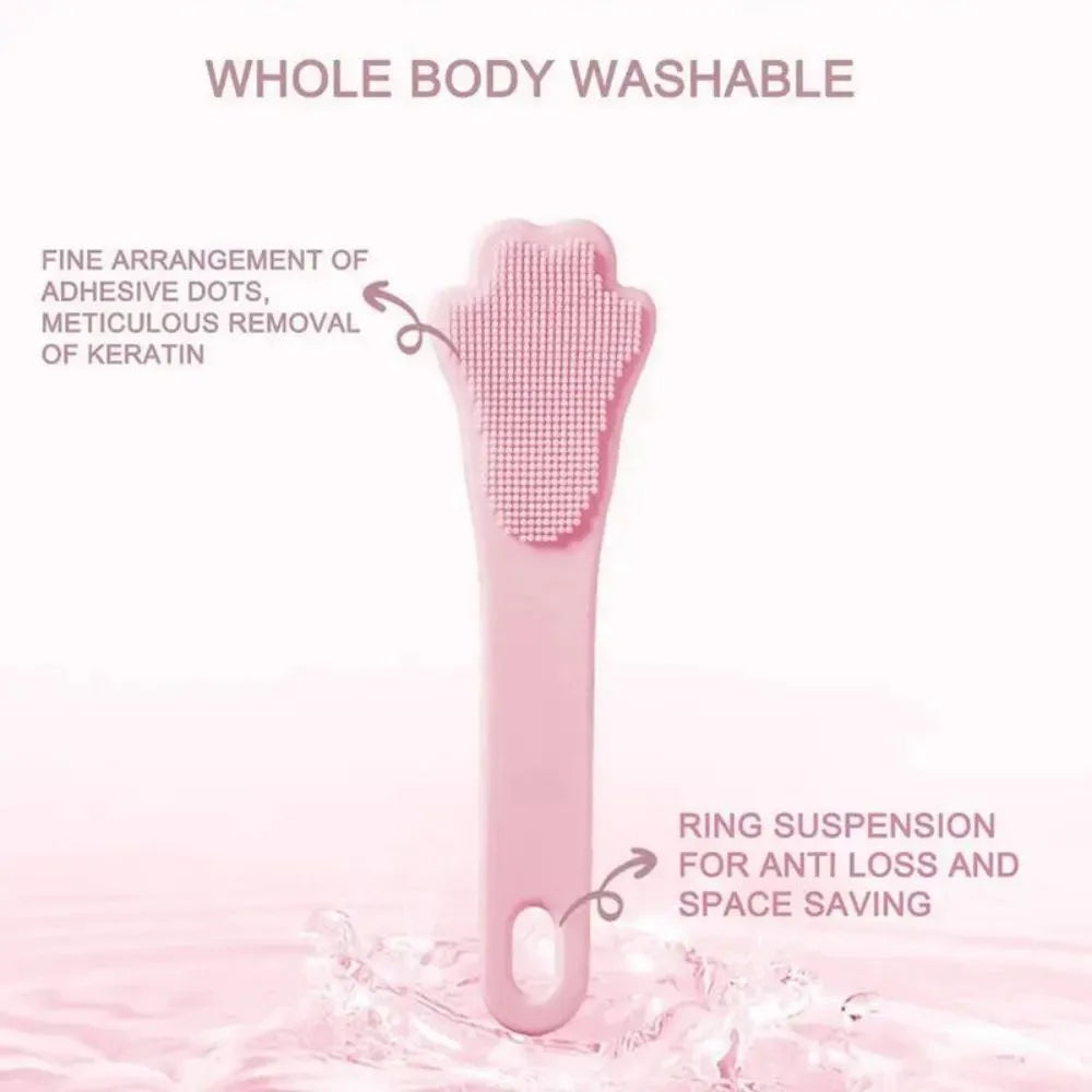 Silicone fingertip toothbrush for pets in pink, purple, and yellow, shown on a finger.