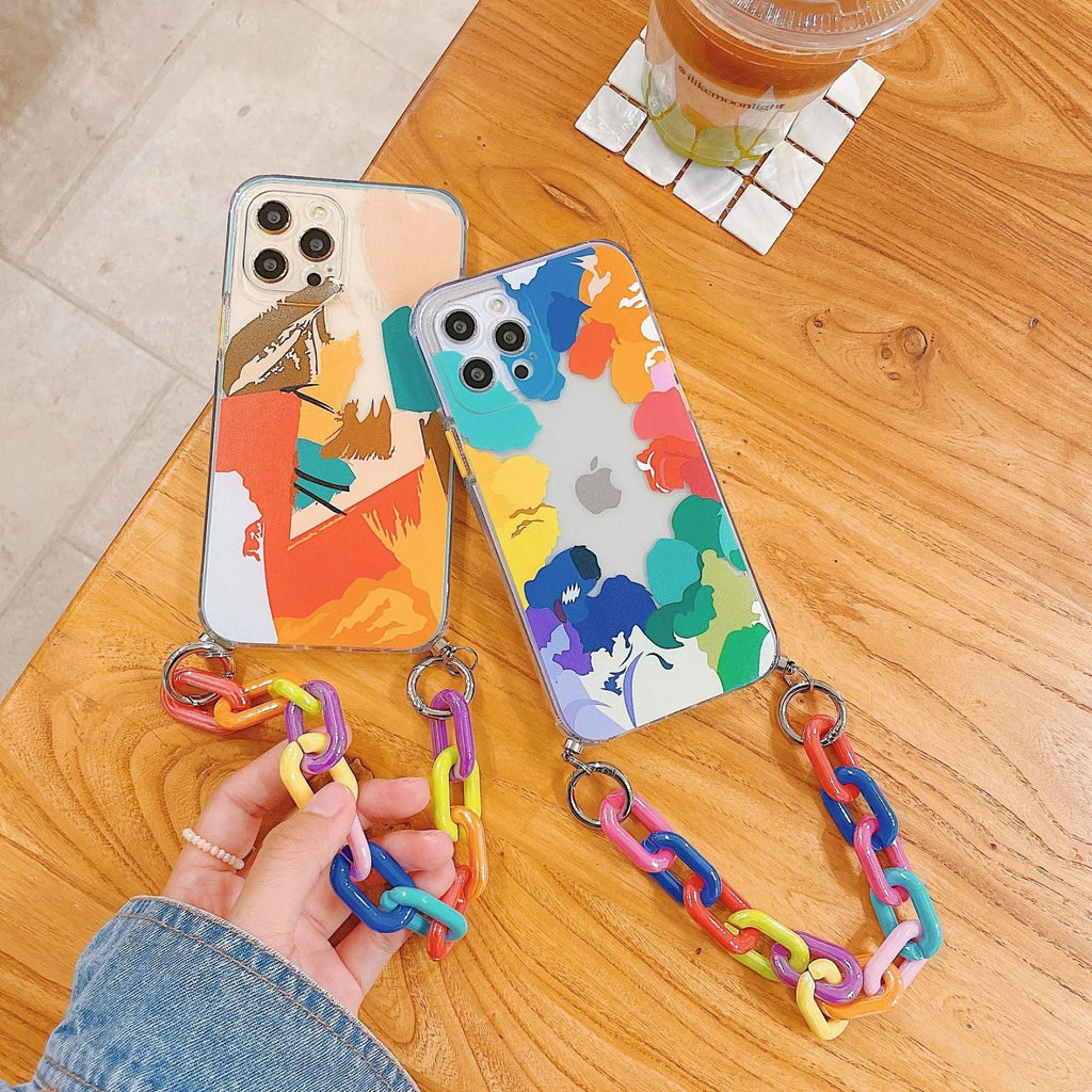 TPU iPhone protective case with integrated bracelet lanyard showing graffiti print design