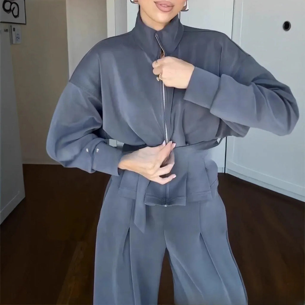 Women's polyester stand collar zip jacket and trousers suit with belt, available in white, dark brown and navy blue