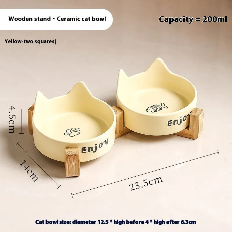 Porcelain cat bowl with cat ears rim and wooden anti-tumble frame in selected colour