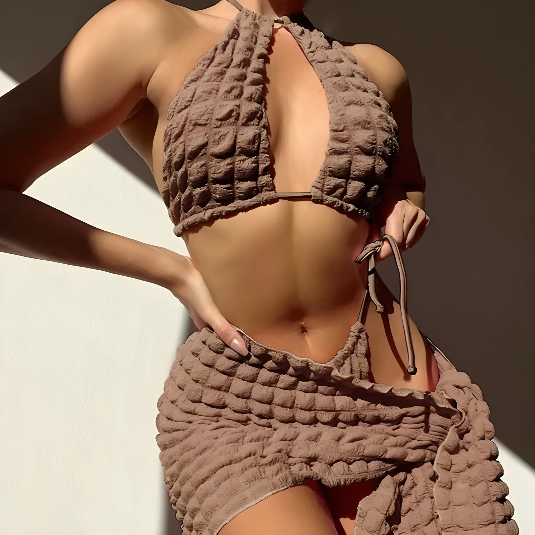 Brown seersucker lace-up bikini top with matching pants and skirt, three-piece women's swimsuit set