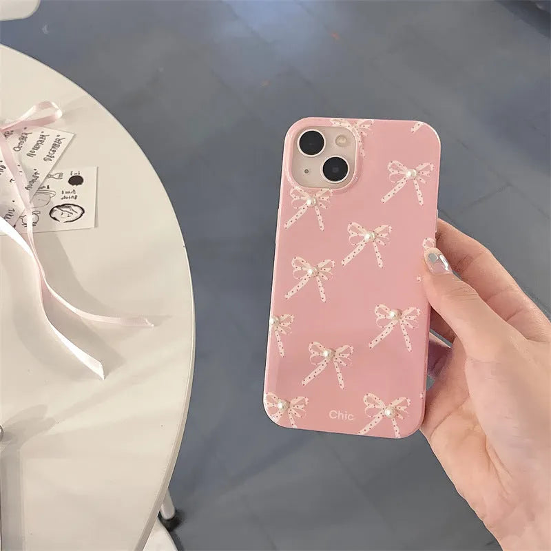 Pink Girl Pearl Bow Stereo Phone Case with three-dimensional pearl dot bow decoration for iPhone 13 Pro Max
