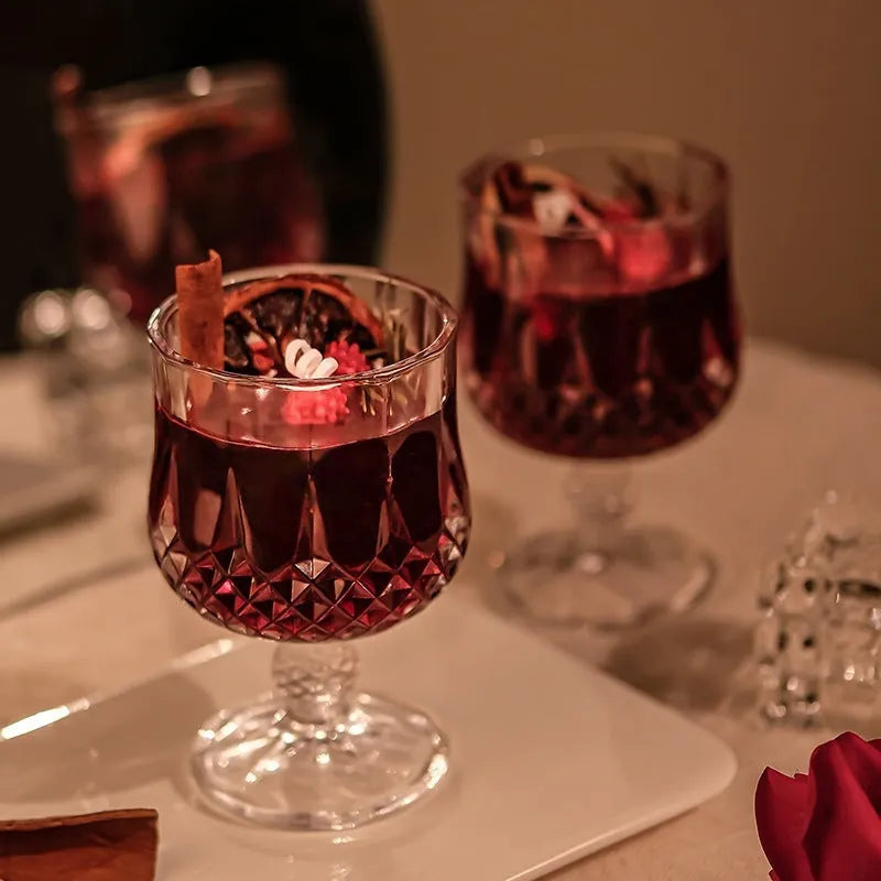 Glass wine goblet shaped aromatherapy candle with French mulled wine fragrance