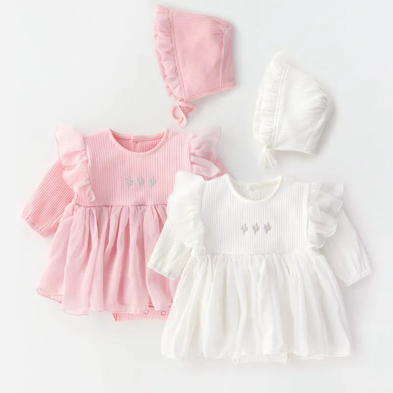 Soft cotton fluffy baby princess dress in pink, shown on a hanger.