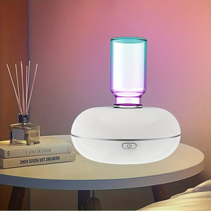 White automatic sensor fragrance machine mini USB diffuser for home bathroom use on a shelf