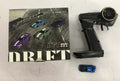 Turbo Racing C64 blue RC drift car with proportional remote control on racing track