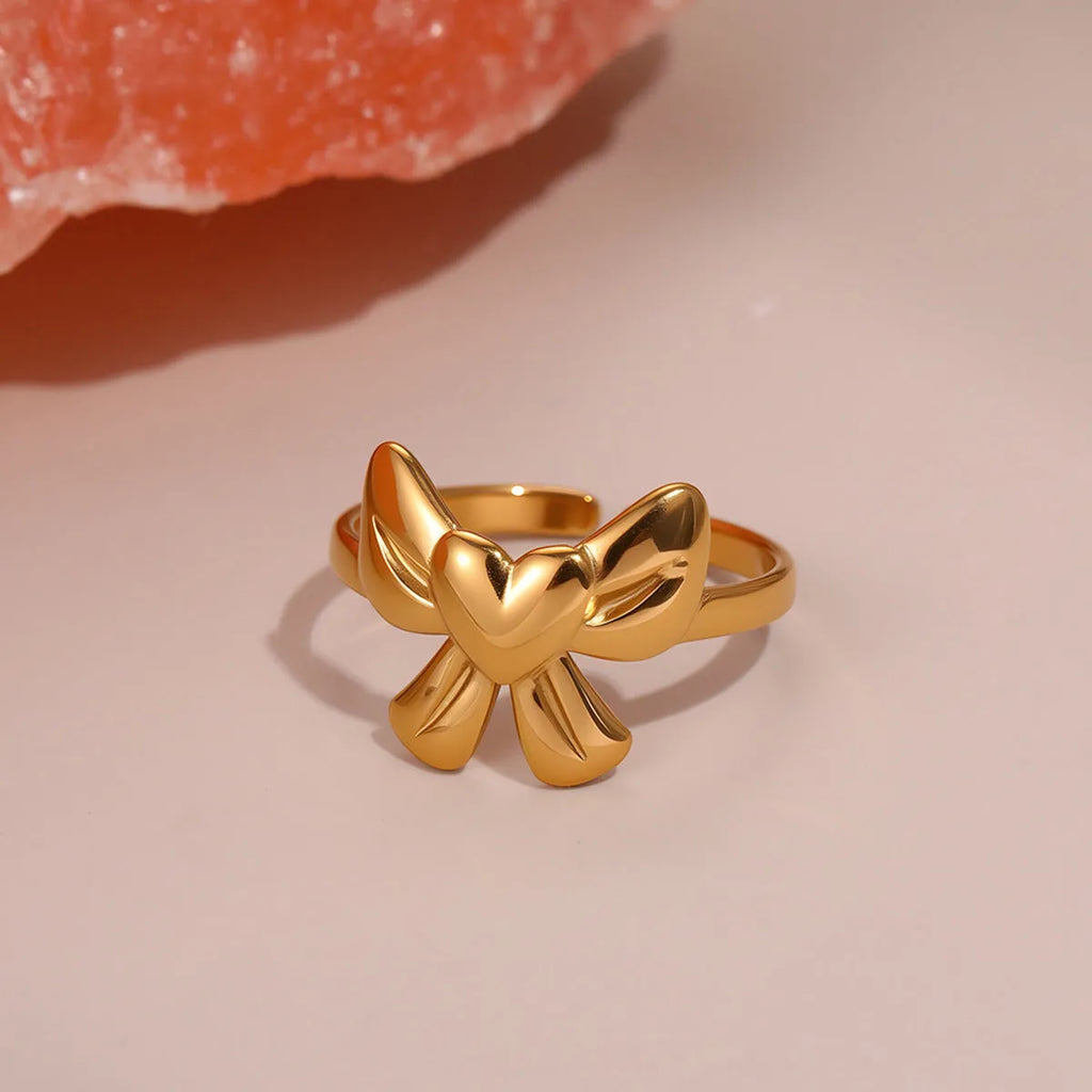 Heart-shaped stainless steel open ring for women with electroplated finish and geometric star design, average size.