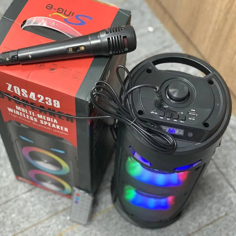 Black portable Bluetooth speaker with dual horn cannon design showing front panel with controls