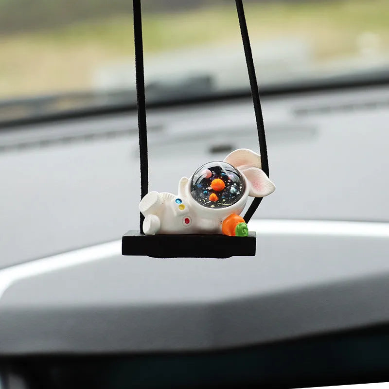 Resin astronaut car pendant with red flag, telescope, and radish designs