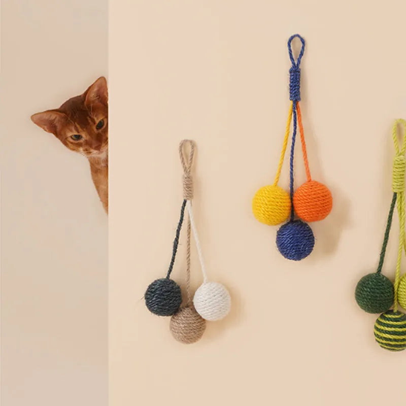 Four-piece cat toy set showing teaser stick and coloured, bite-resistant catnip balls.