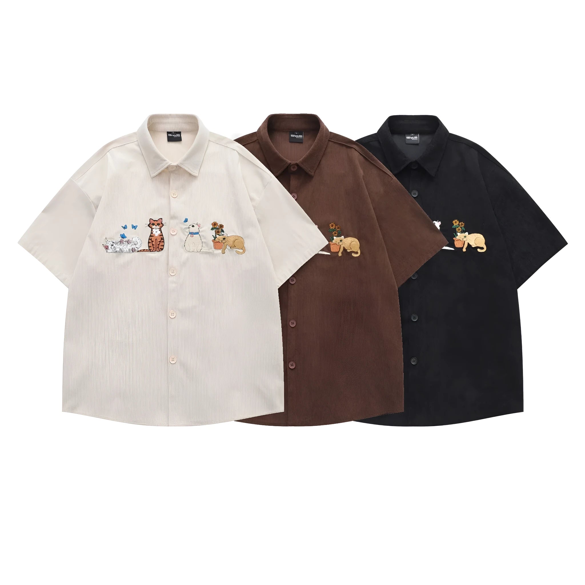 Loose couple shirt with cartoon pattern and embroidery detail in apricot colour