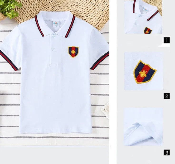 Boy's short sleeve cotton T-shirt with a lapel collar in a solid colour.