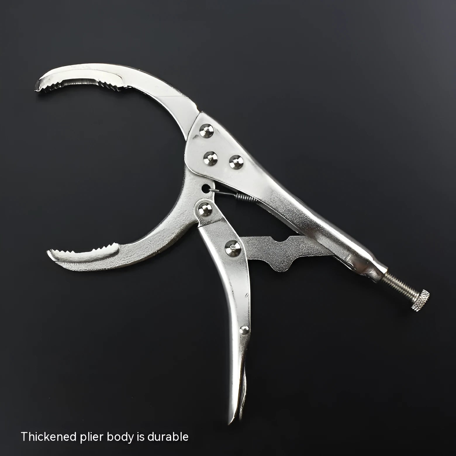 Adjustable clamp oil filter wrench with 50-110mm range on a workshop bench