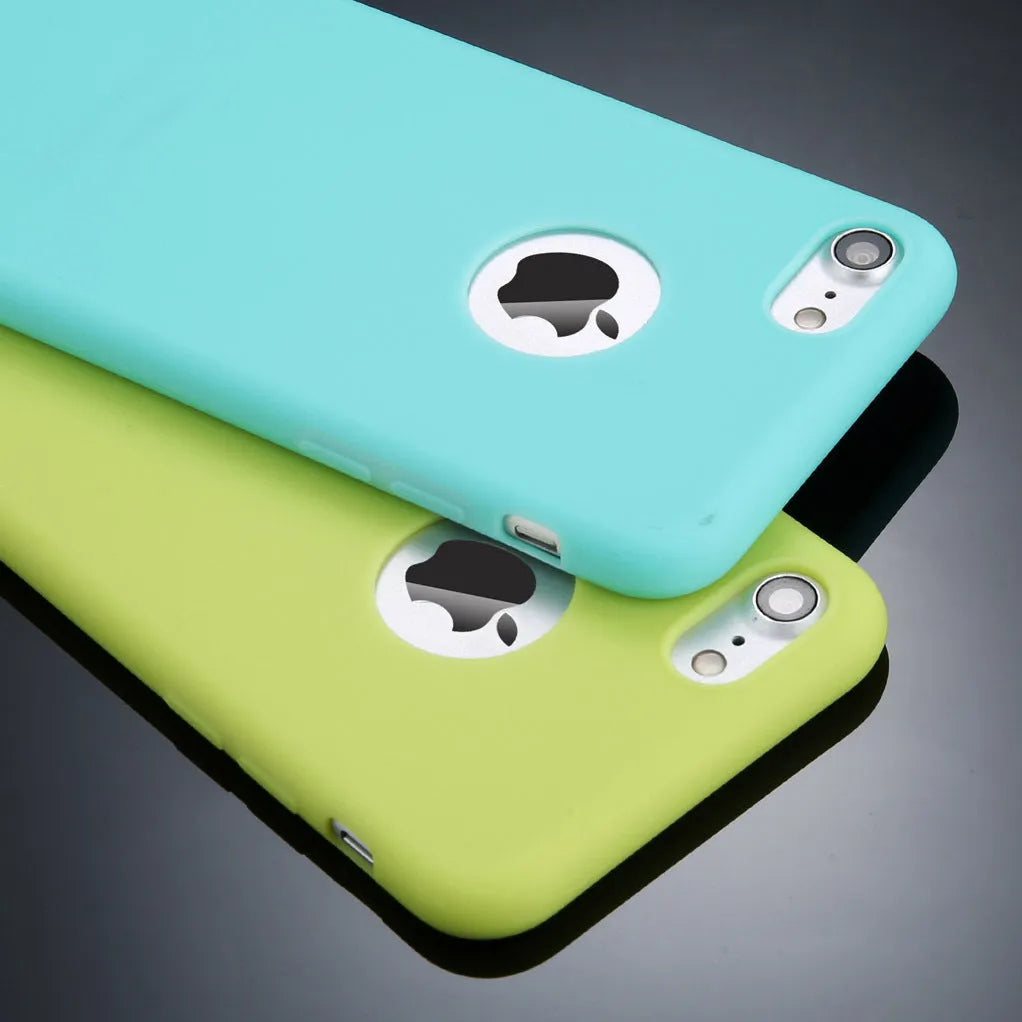 Soft silicon TPU iPhone case in a choice of candy colours on a table.