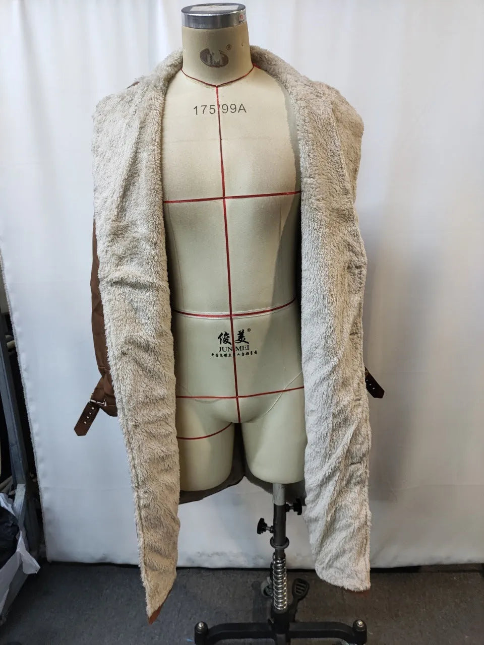 Men's retro brown suede long coat jacket with arctic fleece lining laid flat