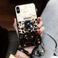 Leopard print pattern TPU back cover case for a mobile phone on a table.