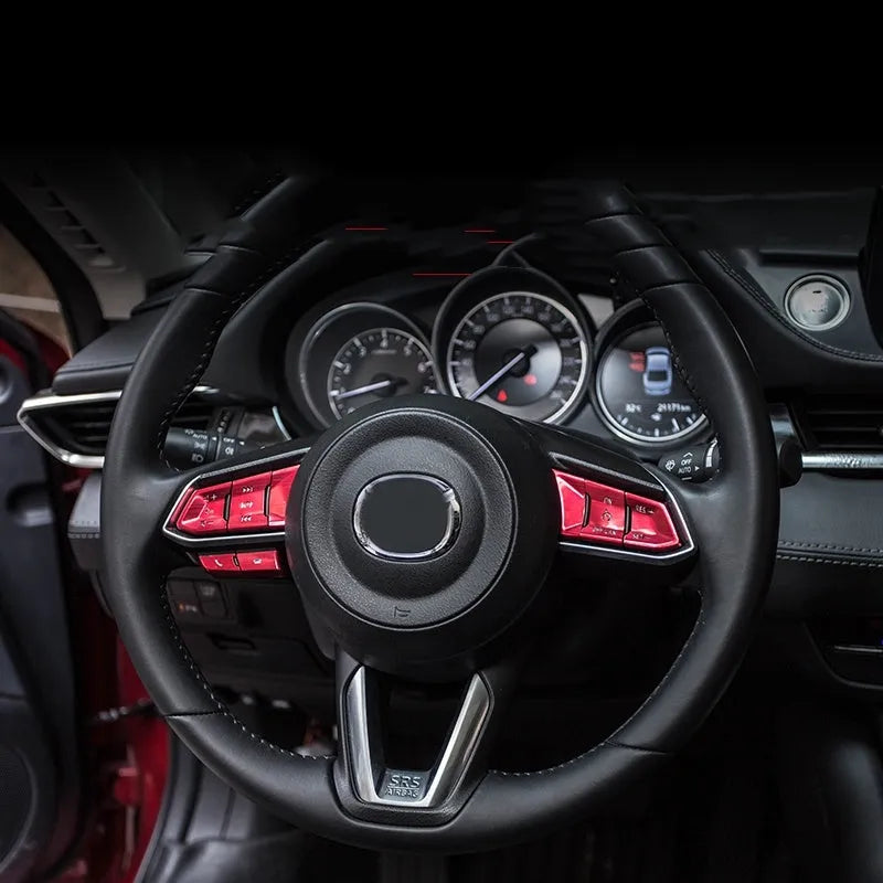 Aluminium alloy decorative steering wheel stickers with transparent button covers in brushed red, silver, and blue colours