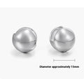 Pair of 925 sterling silver hip-hop style stud earrings for men and women on white background