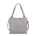 Soft PU retro style crossbody handbag in barrel shape showing pocket sandwich design.