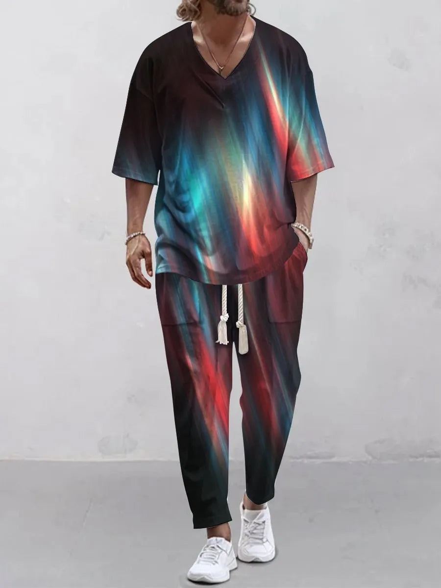 Women's cropped sleeve V-neck trousers suit in thin polyester fabric showing jacket and matching trousers