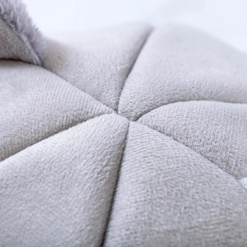 Semi-enclosed warm and fluffy pet nest in plush fabric with raised rim, available in M L and XL sizes for dogs and cats