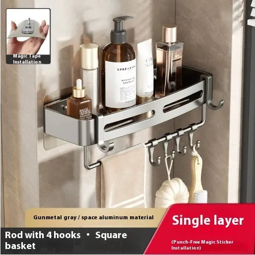 Gun grey wall-mounted corner bathroom storage rack with a single shelf, shown in a shower.