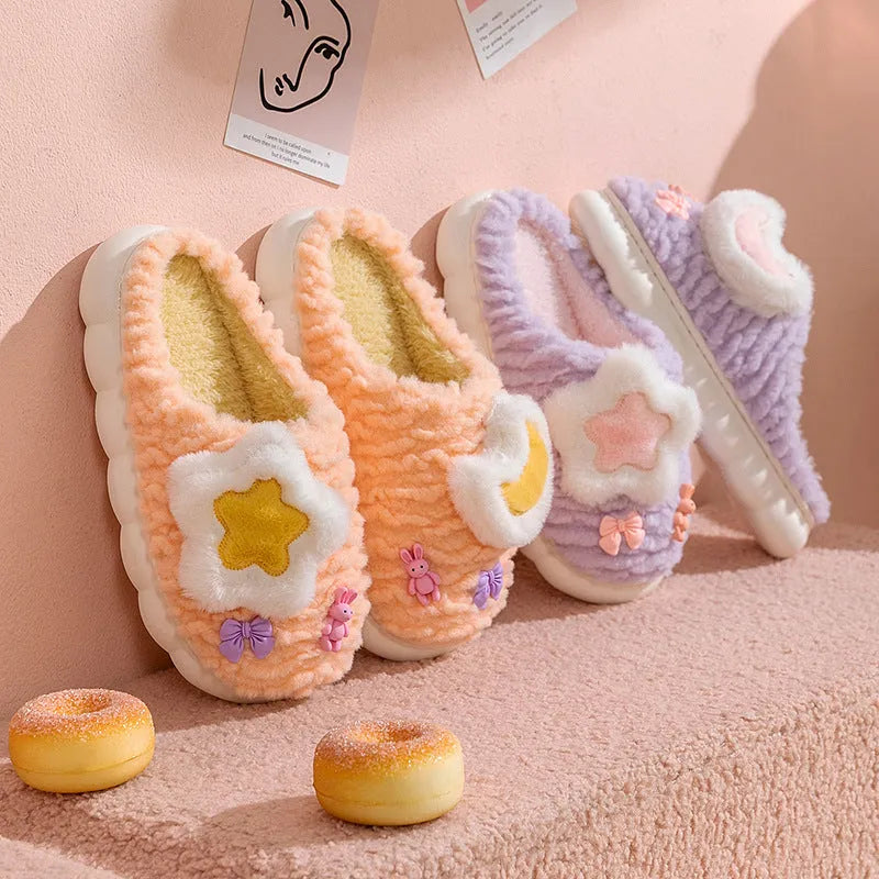 Light blue women's fleece-lined slippers with animal pattern, round toe, and thick sole.
