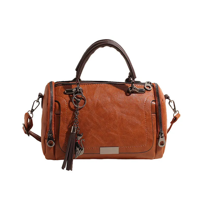 Large capacity women's PU handbag in brown with 26x13x17cm dimensions