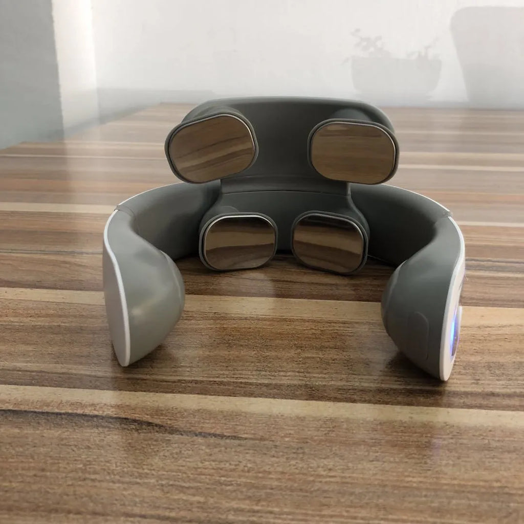 White four-head rechargeable neck massager with mechanical control for domestic neck use