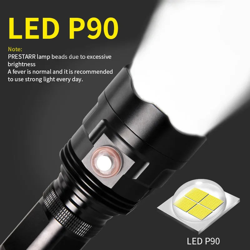 Black anodised aluminium LED flashlight with large head, showing tactical design and side switch